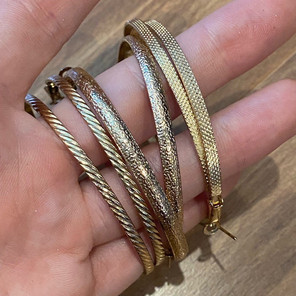3 pairs of big gold hoop earrings